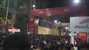 Crowd in front of a Durga Maa pandal waiting to take a glimpse of the deity.